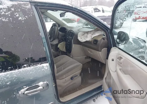 2005 Dodge Caravan Sxt z USA, uszkodzony, nr VIN 1D4GP45R35B129115